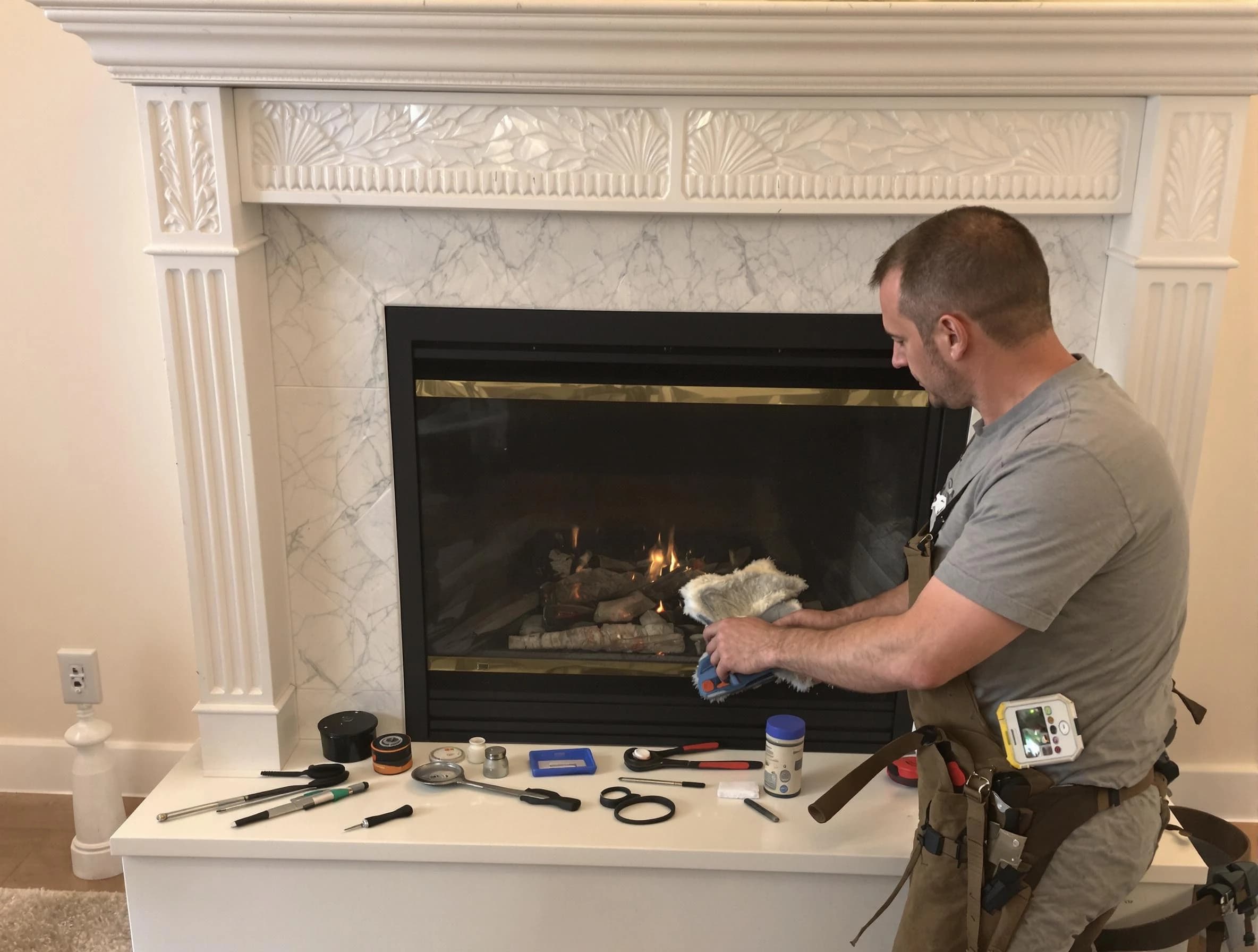 Perth Amboy Chimney Sweep performing fireplace maintenance in Perth Amboy, NJ